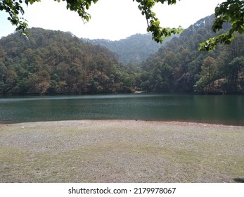 Lake Side View With Lush Green Hills