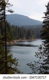 Lake Siskiyou Surrounded By The Shasta-Trinity National Forest With The Trinity Mountains In The Distance Near Mt. Shasta, California.