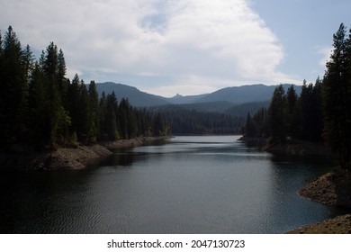 Lake Siskiyou Surrounded By The Shasta-Trinity National Forest With The Trinity Mountains In The Distance Near Mt. Shasta, California.