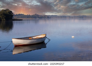 Lake of Sjaelso and boat in Denmark in Autumn - Powered by Shutterstock