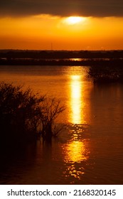 Lake at sunset, Black Point Wildlife Drive, Merritt Island National Wildlife Refuge, Titusville, Florida, USA - Shutterstock ID 2168320145