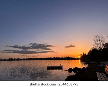 Lake sunset with floating dock - Powered by Shutterstock