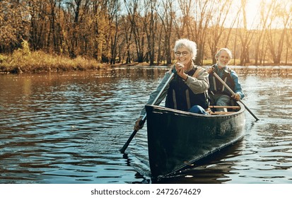 Lake, sunshine and kayak with old couple, nature and retirement with happiness, getaway trip and vacation. Outdoor, river and mature man with senior woman, rowing and trust with holiday and romance - Powered by Shutterstock