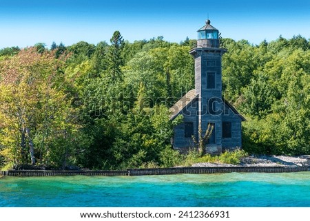 Lake Superior The Grand Island East Channel Light,north of Munising (MI),wood constructed lighthouse was opened for service in 1868,Due to poor visibility from the lake was removed from service 1908  