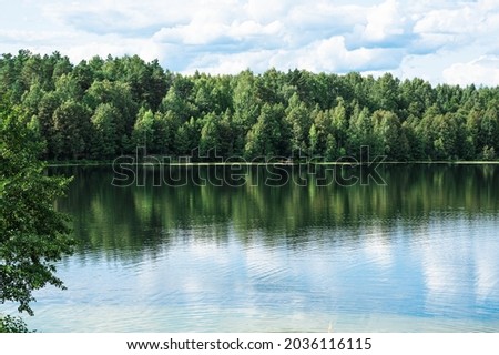 Lake Svetloyar photographed in Russia is under the protection of UNESCO. Scenic spots are places of power for local population. Coniferous and deciduous forests are located around lake.