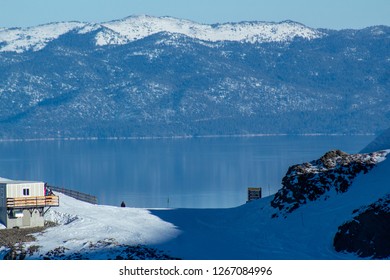 Lake Tahoe Views At The Top Of A Snow Covered Squaw Valley Mountain.