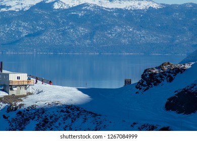 Lake Tahoe Views At The Top Of A Snow Covered Squaw Valley Mountain.