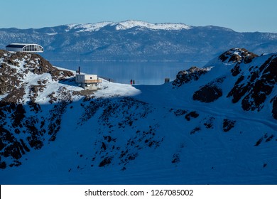 Lake Tahoe Views At The Top Of A Snow Covered Squaw Valley Mountain.