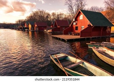 Deritő tó lake in Tata Hungary with cute colorful fishing cabins