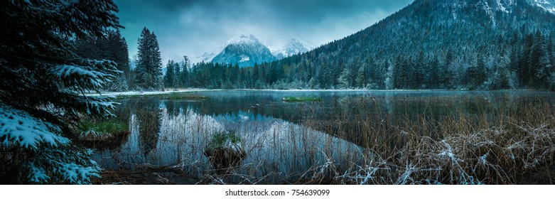 Lake Taubensee in the Alps of Bavaria on a day in winter