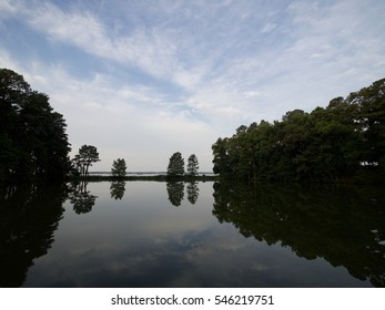 Lake trees sky reflection
