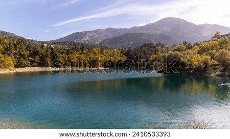 Lake Tsivlou (Achaia, Greece). Beautiful reflections on the water. A famous destination for camping, trails, picnic or water activities. 