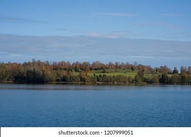 Lake View Of Mälaren At Adelsö And Björkö, Birka, In Stockholm A Pale Autumn Day With Blue Sky And Sea With  Clouds And Orange Leafs