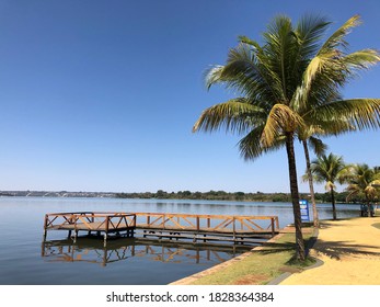 Paranoá Lake With Wooden Deck And Palm Trees