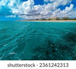 The Lake Worth Florida Pier and Waves on the beach