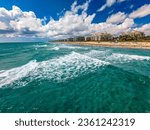 The Lake Worth Florida Pier and Waves on the beach