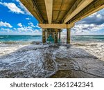 The Lake Worth Florida Pier and Waves on the beach