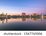 Lakeland, Florida, USA downtown cityscape on the lake at twilight.