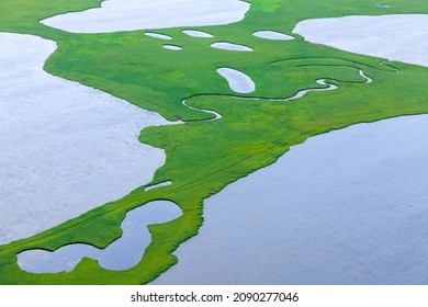 Lakes in summer lowland, top view - Shutterstock ID 2090277046