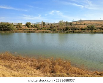 lakeside fishing spot picnic area background landscape