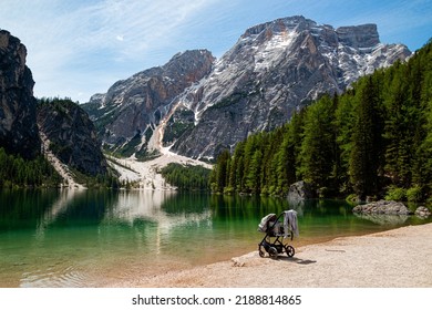 Lakeside hiking trail at iconic mountain lake Pragser Wildsee (Lago di Braies) in Dolomites, Unesco World Heritage, South Tyrol, Italy