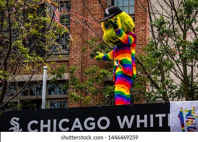 Lakeview, Chicago-June 30, 2019: Chicago White Sox mascot Southpaw wearing a rainbow suit and waving to the crowd at Gay Pride.