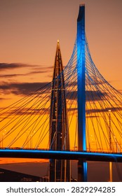 The Lakhta Center skyscraper and the cable-stayed bridge support at sunset. Close-up. St. Petersburg, Russia – August 4, 2026.