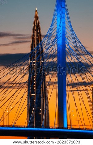 The Lakhta Center skyscraper and the cable-stayed bridge support at sunset. Close-up. St. Petersburg, Russia – August 4, 2026.