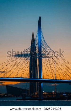 The Lakhta Center skyscraper and the cable-stayed bridge support at sunset. Close-up. St. Petersburg, Russia – August 4, 2026.