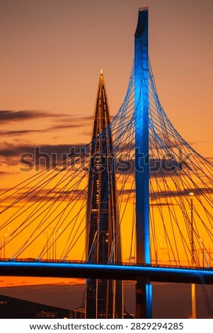 The Lakhta Center skyscraper and the cable-stayed bridge support at sunset. Close-up. St. Petersburg, Russia – August 4, 2026.