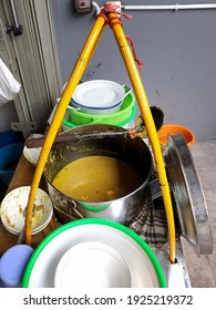 Laksa Sauce In An Aluminum Container. Laksa Is A Spicy Traditional Food From Bogor, Indonesia, With Rice Vermicelli, Coconut Milk, Curry Soup Base.