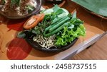 Lalapan vegetable is a traditional Indonesian dish consisting of various types of fresh vegetables served raw as a complement to the main dish. This dish is Indonesian cuisine (Urwah Al Bariqi) 