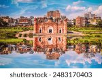 Lalbagh Fort Framed by Lush Greenery on a Sunny Day in Dhaka