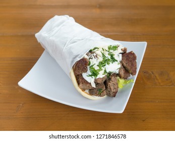 Lamb And Beef Gyro Served From A Mediterranean Food Cart In Portland, Oregon.