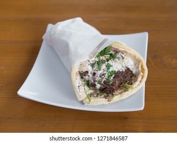 Lamb And Beef Gyro Served From A Mediterranean Food Cart In Portland, Oregon.