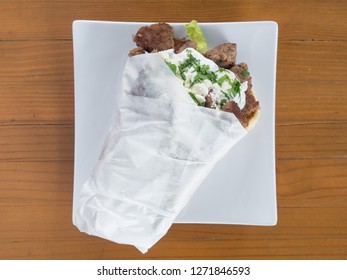 Lamb And Beef Gyro Served From A Mediterranean Food Cart In Portland, Oregon.