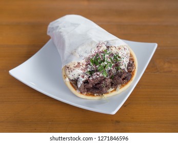 Lamb And Beef Gyro Served From A Mediterranean Food Cart In Portland, Oregon.