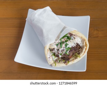 Lamb And Beef Gyro Served From A Mediterranean Food Cart In Portland, Oregon.