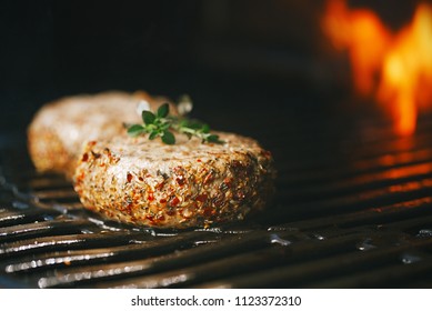 Lamb Burgers Spiced By Mint And Lamb Rub On Bbq Grill With Flame