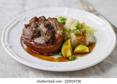 Lamb Chop With Celeriac Mash, Peas And Brussel Sprouts