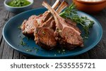 Lamb Chops: Succulent lamb chops with a perfectly seared crust, garnished with fresh herbs, highlighting the richness and depth of flavor in this classic dish