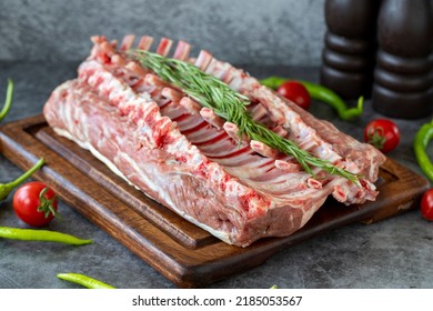 Lamb Chops. Whole Fresh Lamb Chop Or Rib Chop On Dark Background. Butcher Products. Close Up