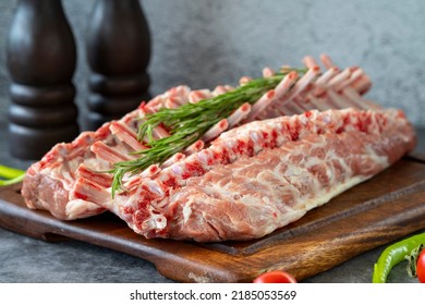 Lamb Chops. Whole Fresh Lamb Chop Or Rib Chop On Dark Background. Butcher Products. Close Up