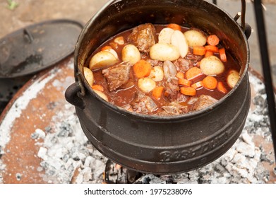 Lamb curry cooked in a traditional South African Potjiekos, which is "small pot food" in Afrikaans.  Durban, South Africa.