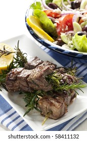 Lamb Kebabs Grilled On Rosemary Skewers, With Greek Salad.  Delicious!