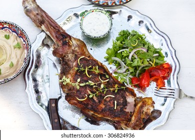 Lamb Leg Roast On A Steel Plate