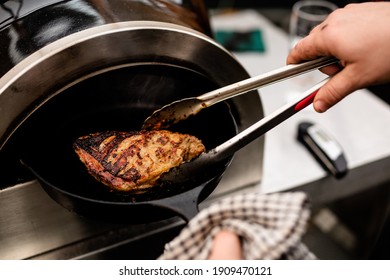 Lamb Rump Being Cooked In A Cast Iron Pan