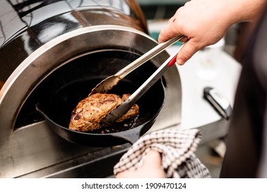 Lamb Rump Being Cooked In A Cast Iron Pan