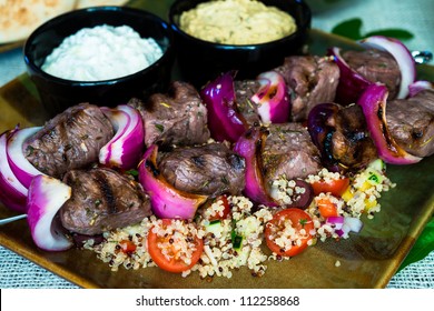 Lamb Skewer Kabobs With Tzatziki Sauce And Hummus: Lamb Beef Kebab Skewers Grilled With Quinoa Salad And Tzatziki And Hummus Sauce