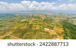 Lamia, Phthiotis, Greece. Panorama of the valley with fields. Olive trees, colorful fields. Summer, Cloudy weather. Aerial view